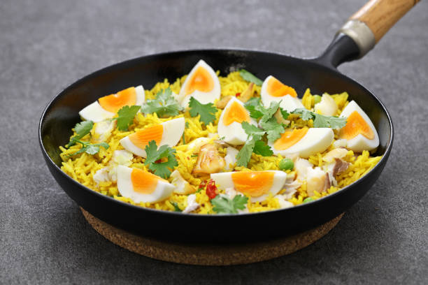 Breakfast: খিচুড়ি ও ডিম (Khichuri o Dim) – Spiced Lentil-Rice with Boiled Egg