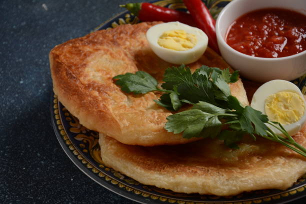 Breakfast: تخم و نان (Tokhm wa Naan) – Boiled Eggs with Bread
