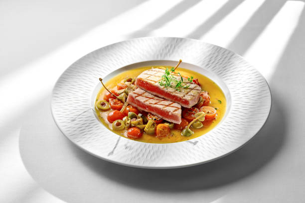 Breakfast: Fresh Fish Sashimi with Coconut Cream (Pronounced: /frɛʃ fɪʃ səˈʃiːmi wɪð ˈkoʊkənʌt kriːm/) – Thinly Sliced Raw Fish Drizzled with Coconut Cream