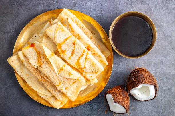 Breakfast: Karewe (Toddy) Pancakes/Fritters (Pronounced: /kaːˈreɪweɪ ˈpænkeɪks/) – Pancakes or Fritters Sweetened with Coconut Sap