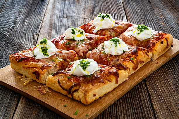 Pizza al Metro (Pronounced: /ˌpitsza al ˈmɛtro/)