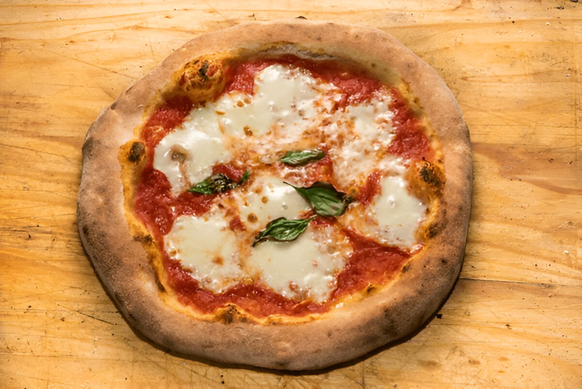 Pizza Scrocchiarella (Pronounced: /ˌpitsza skrokkjaˈrɛlla/)