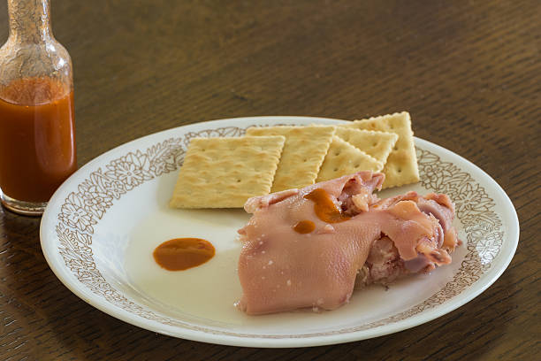 Breakfast: Souse & Crackers (Pronounced: /saʊs ænd ˈkrækərz/) – Pickled Pork with Crackers